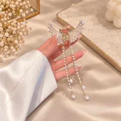 The clip held up against white satin