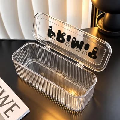 The empty case open, with its ribbed sides and “PRIMIT” printed on the lid