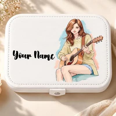 A white jewelry box printed with a girl playing a guitar, with “Your Name” beside her