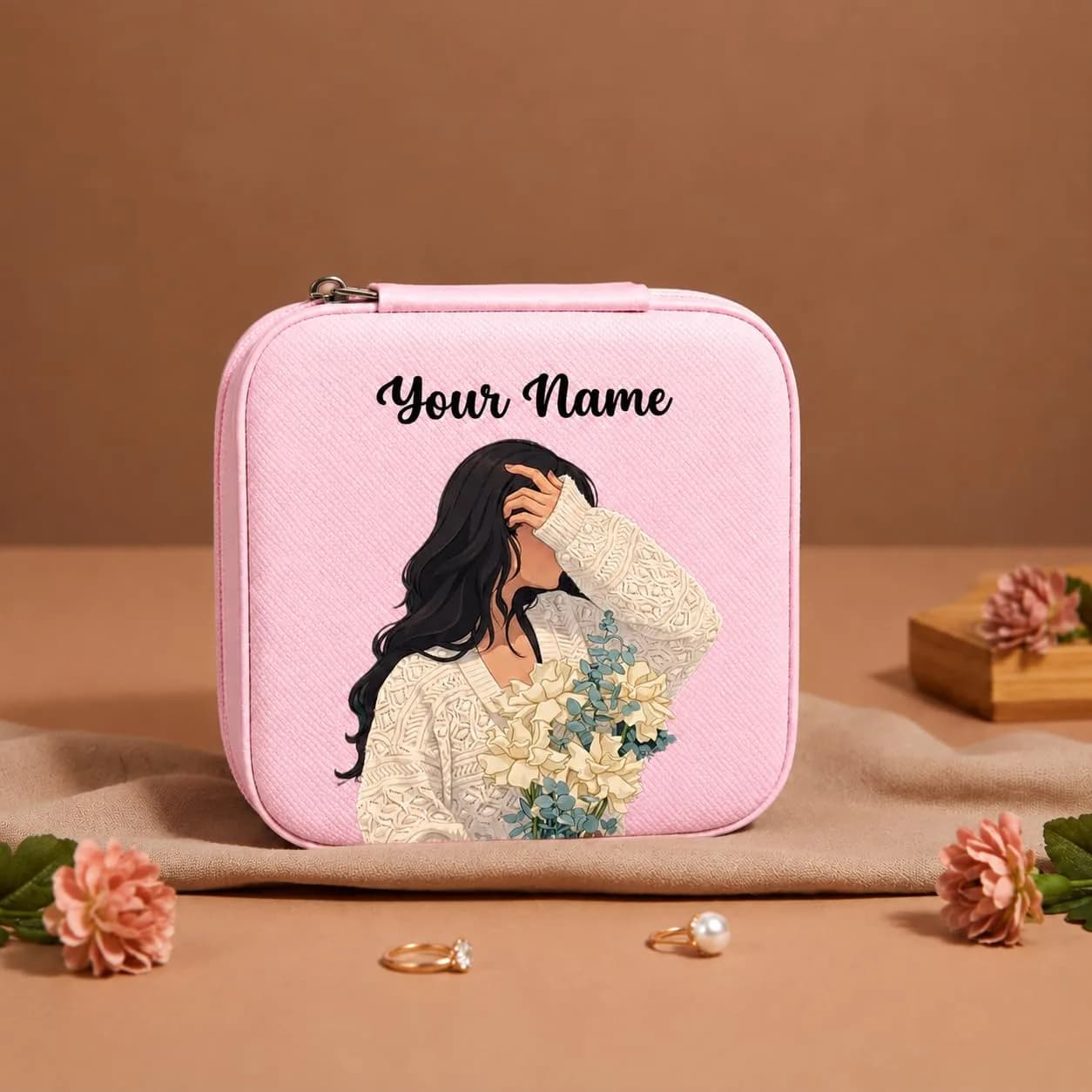 A pink mini jewelry box printed with a woman in a cream lace top holding pale flowers, with “Your Name” above her
