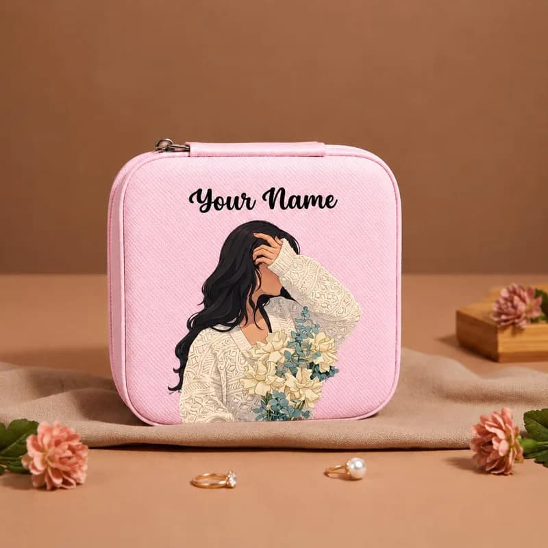 A pink mini jewelry box printed with a woman in a cream lace top holding pale flowers, with “Your Name” above her