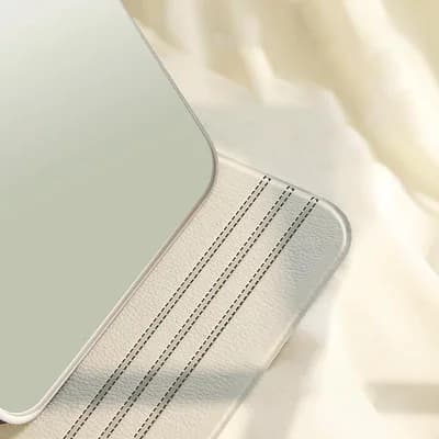 A close view of the stitched edge of the cover