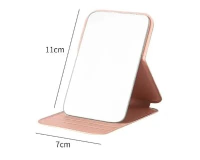The mirror on its stand, marked 11 cm tall and 7 cm wide