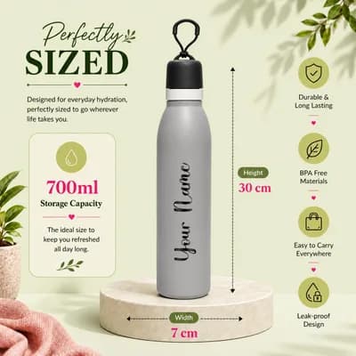 The matte gray bottle beside its measurements: 700 ml, 30 cm tall and 7 cm wide