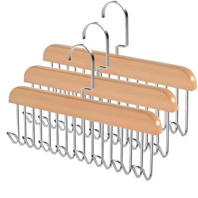 Three wooden hangers stacked one behind another